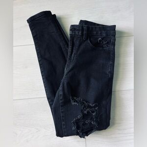 American Eagle, Women's distressed black skinny jeans. Size 6